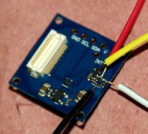 Breaking out the I2C interface traces to drive my pressure sensor. My first "real" hack on the project so far.