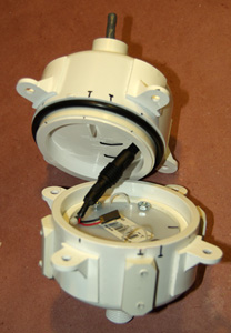 The gap between the two shells provides room for the interconnect, and some filtering caps, etc. if needed. 