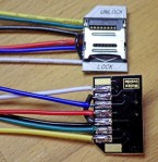 These guys are only $1.5 each, and are much easier to work with than the plastic micro SD adapters