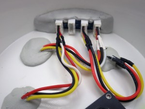 Good old JB plastiweld lets me tuck the Groove hub up out of the way, as all the real estate on my platform is taken up with the battery holders.