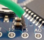 Yes it is possible to add a jumper on the Aref line of a pro mini.