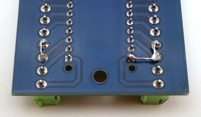 Reset terminals repurposed with jumpers under the board